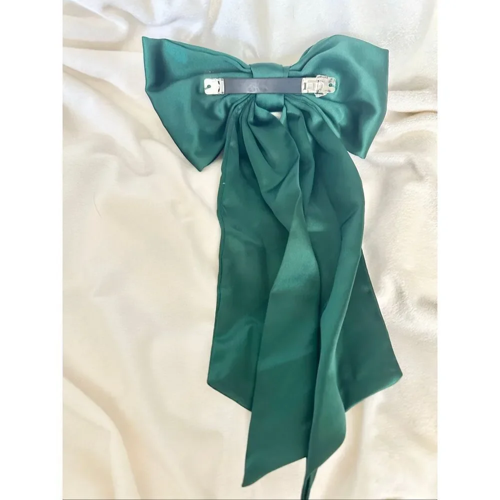 Elegant green satin holiday bow - with Barrett clip close - great for thick hair